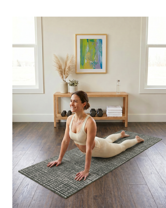 Sloane Forest Studio Mat, a non-toxic green yoga mat for studio and home in a textured forest crosshatch.