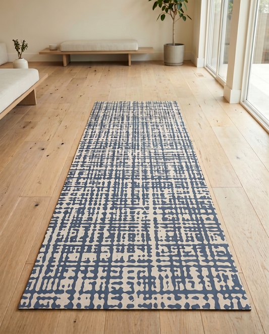Sloane Navy Studio Mat, a non-toxic blue yoga mat for studio and home in a textured navy design.