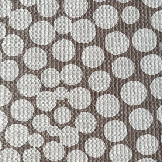 Swankymat non-toxic eco-friendly extra large exercise mat and play mat in modern neutral circles pattern in living room in closeup