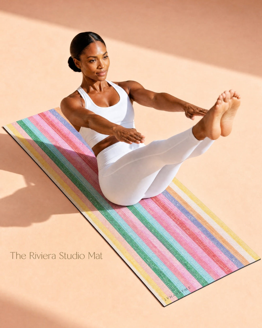 Riviera multicolor Studiomat by swankymat with woman doing pilates.