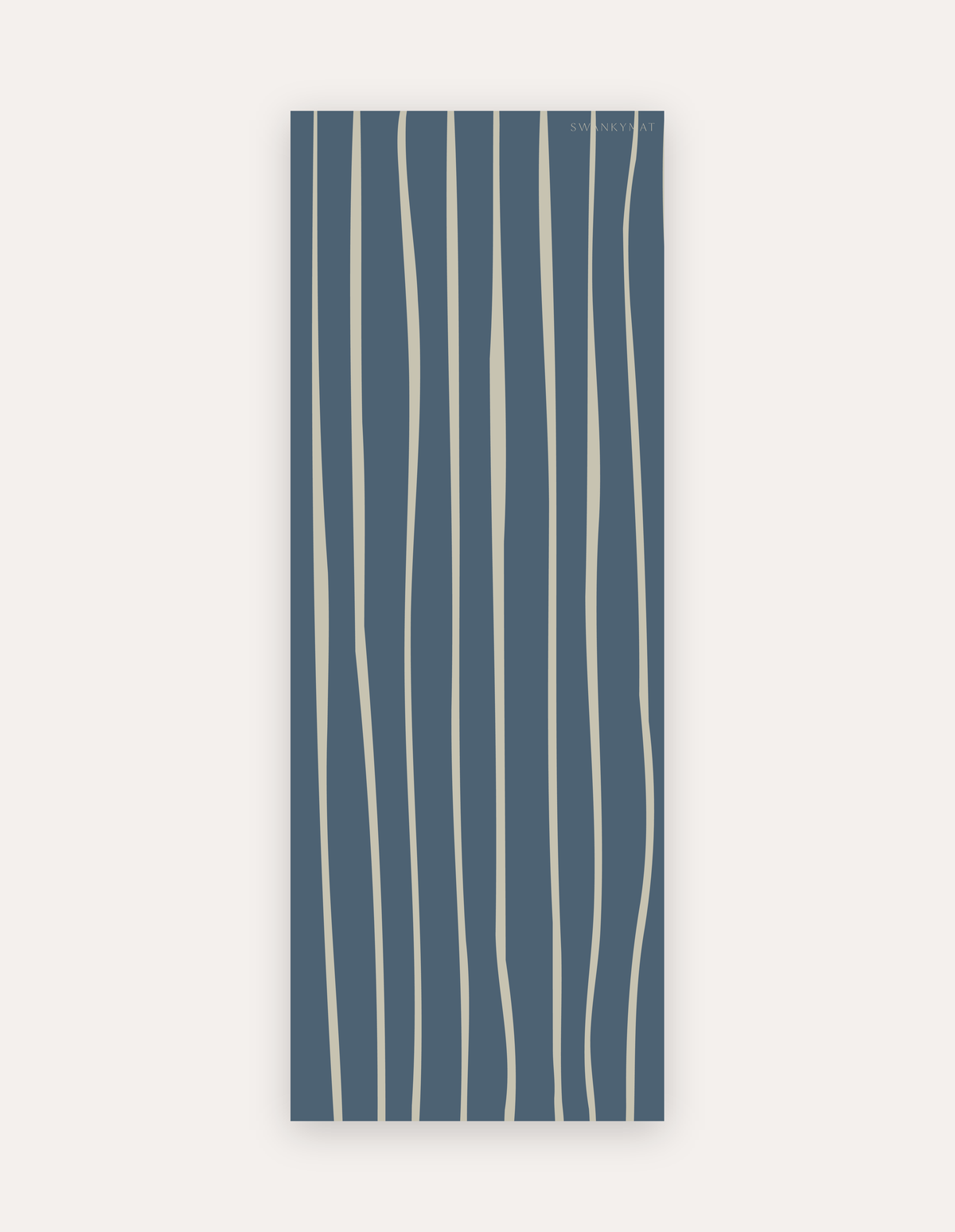 Wavy Cove Studio Mat, a rollable non-toxic high-density foam studio mat with free-flowing cream wavy lines over deep slate blue, shown flat for yoga, pilates and HIIT