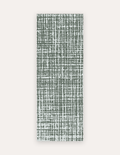 Sloane Forest studio mat in forest-green crosshatch on soft ivory, a non-toxic high-density foam yoga and pilates mat that rolls up to store
