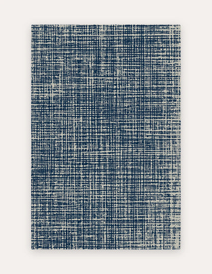 Sloane Midnight non-toxic exercise mat in deep midnight-blue crosshatch, 6x9 ft — a cushioned-foam rug alternative for home workouts and play