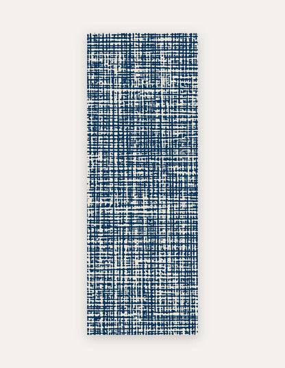 Sloane Midnight Studio Mat, a rollable non-toxic high-density foam studio mat in a deep midnight-blue crosshatch, shown flat for yoga, pilates and HIIT