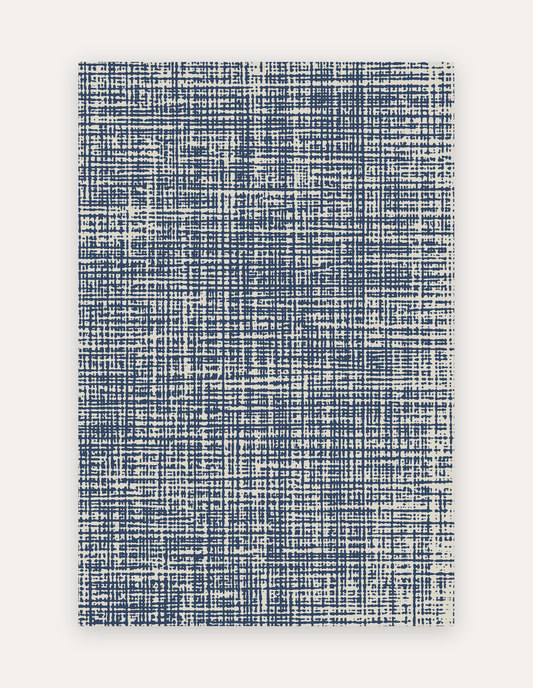 Sloane Navy oversized mat shown flat in a 6x9 ft size, navy-blue crosshatch linen design on cushioned non-toxic foam, a modern rug alternative