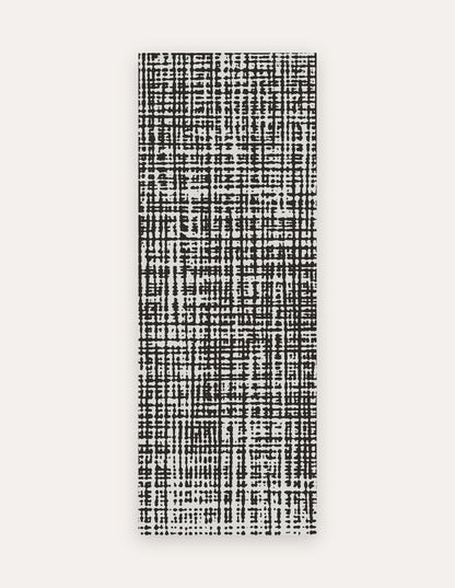 Sloane Onyx Studio Mat, a rollable non-toxic high-density foam studio mat with a hand-drawn black crosshatch over pale gray, shown flat for yoga, pilates and HIIT