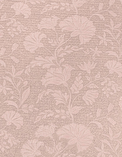Close-up of the Flora Blush exercise mat surface, showing the blush-mauve botanical floral pattern on cushioned non-toxic high-density foam