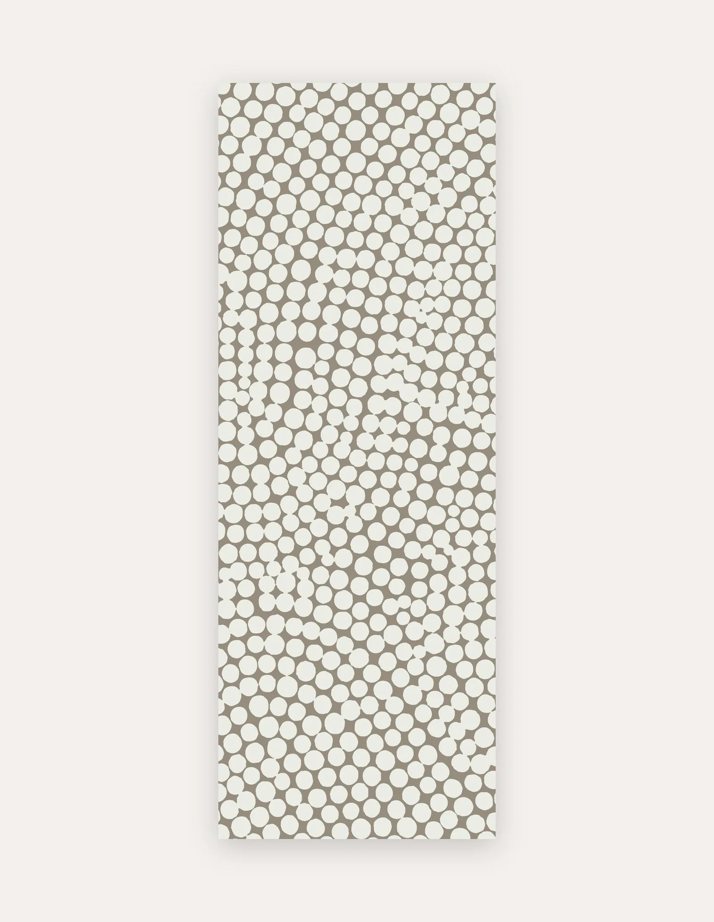 Circa Sandstone Studio Mat, a rollable non-toxic high-density foam studio mat in a warm sandstone pebble-dot design, shown flat for yoga, pilates and HIIT