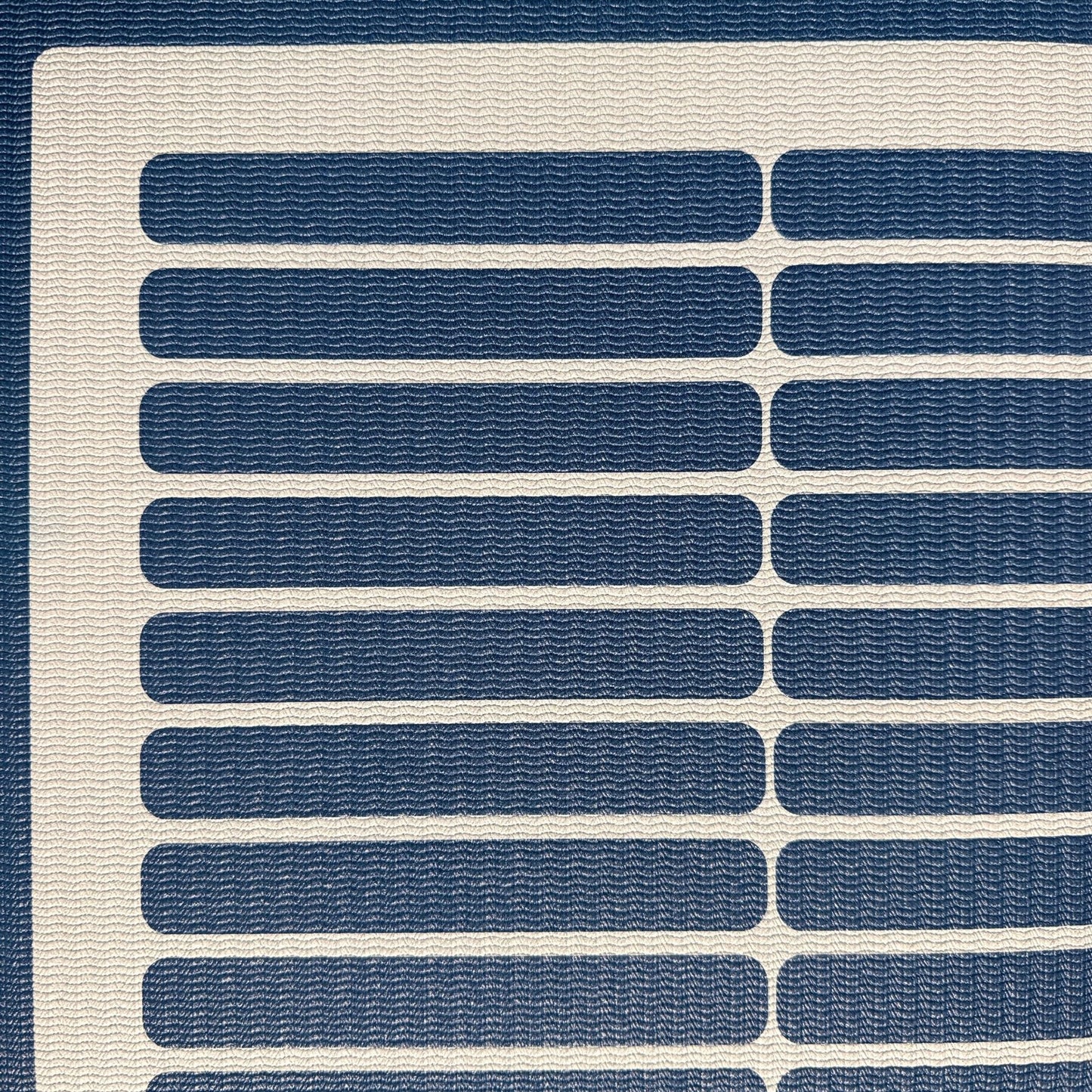 Closeup of Swankymat in Arlo Navy modern geometric design