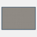 Rectangular rug with a neutral and blue geometric pattern on a plain background