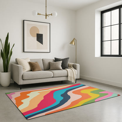 Swankymat rainbow abstract exercise mat and play mat in modern living room with grey sofa, black window, and wall art.