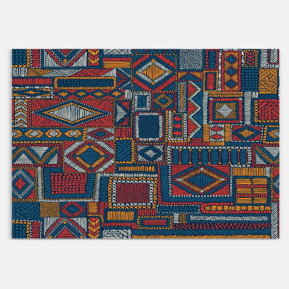 Swankymat tribal geometric foam exercise mat and play mat with colorful red, blue, and yellow pattern design.