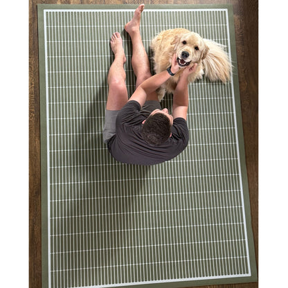 Large baby play mat in modern green pattern.