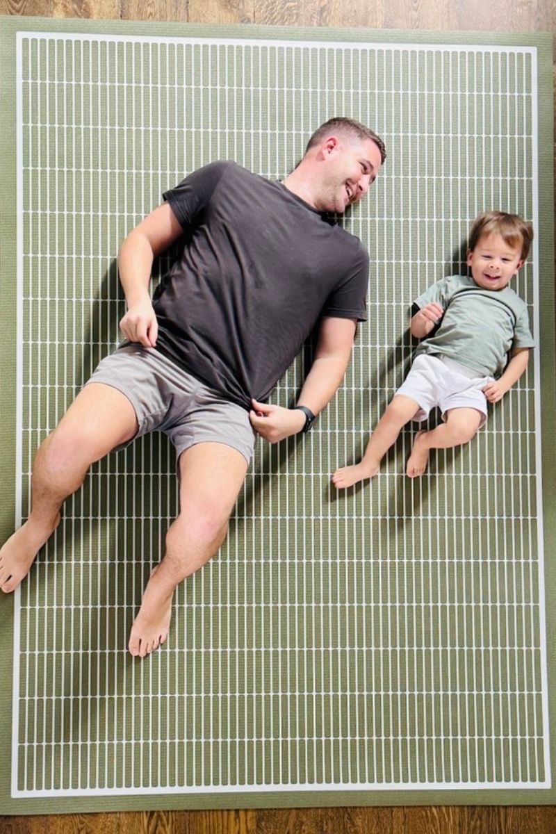 Man and child exercising on Swankymat non toxic large yoga mat in modern green neutral pattern