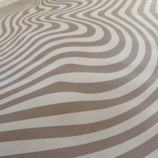 Large baby play mat in neutral brown modern pattern.