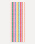 Swankymat The Riviera Mat non-toxic foam studio yoga and exercise mat, 26 by 71 inch studio size, bright multicolor woven cabana stripe pattern in yellow, green, aqua, coral, pink, blue, and orange shown flat from above