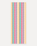 Swankymat The Riviera Mat non-toxic foam studio yoga and exercise mat, 26 by 71 inch studio size, bright multicolor woven cabana stripe pattern in yellow, green, aqua, coral, pink, blue, and orange shown flat from above